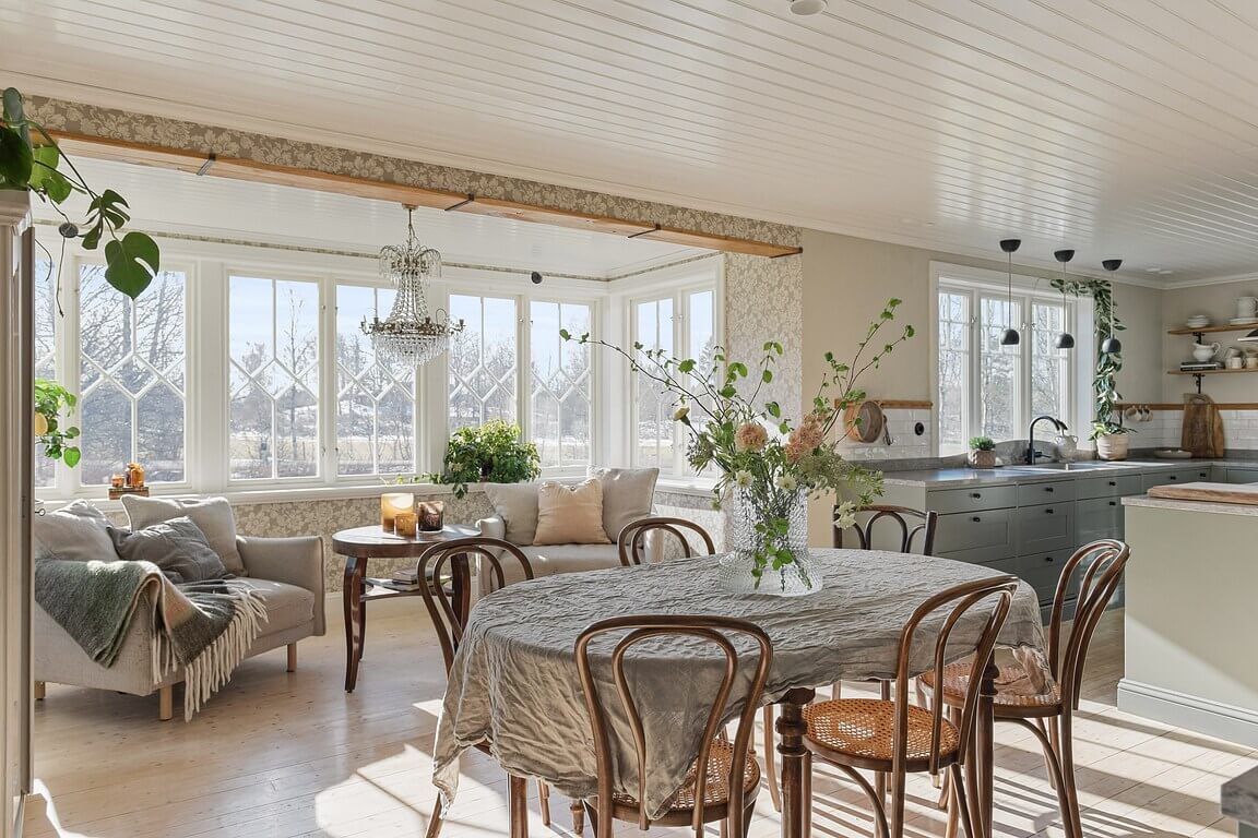 An Idyllic Family Home in the Swedish Countryside 3 open-plan-kitchen-dining-room-natural-light-vintage-decor-nordroom