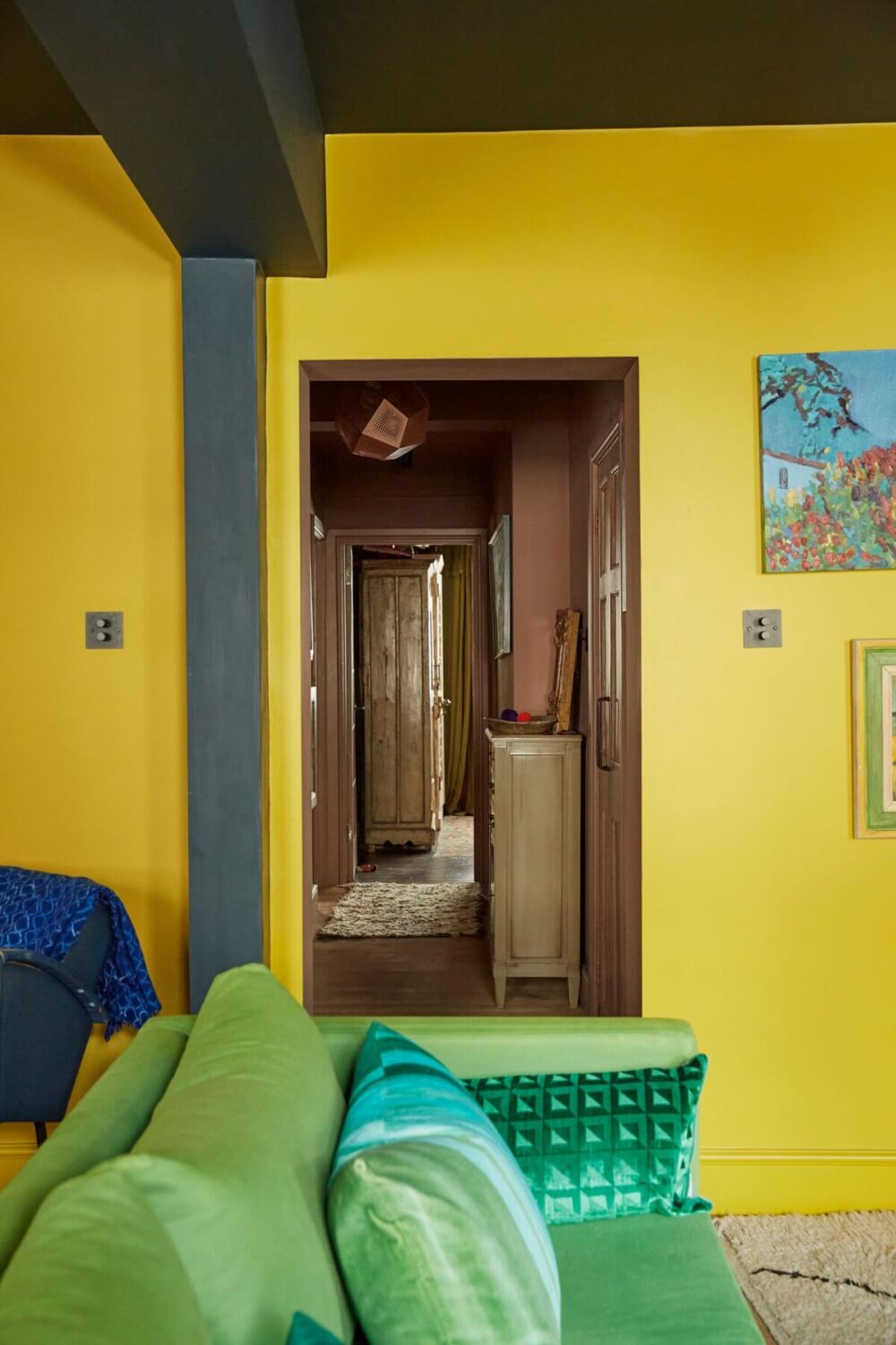Jewel-Toned Hues in a Vibrant Eclectic Mews House 6 paint-and-paper-gamboge-wall-color-nordroom