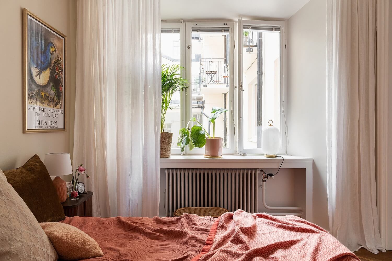 A Serene Nordic Apartment with Pink Color Accents 18 pink-bedding-scandinavian-bedroom-nordroom