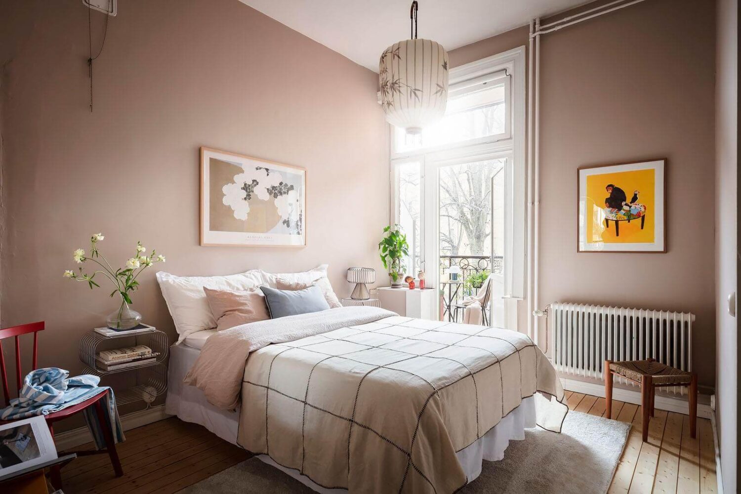 A Stylish Nordic Apartment with a Pink Bedroom 8 scandinavian-bedroom-pink-walls-balcony-wooden-floor-nordroom