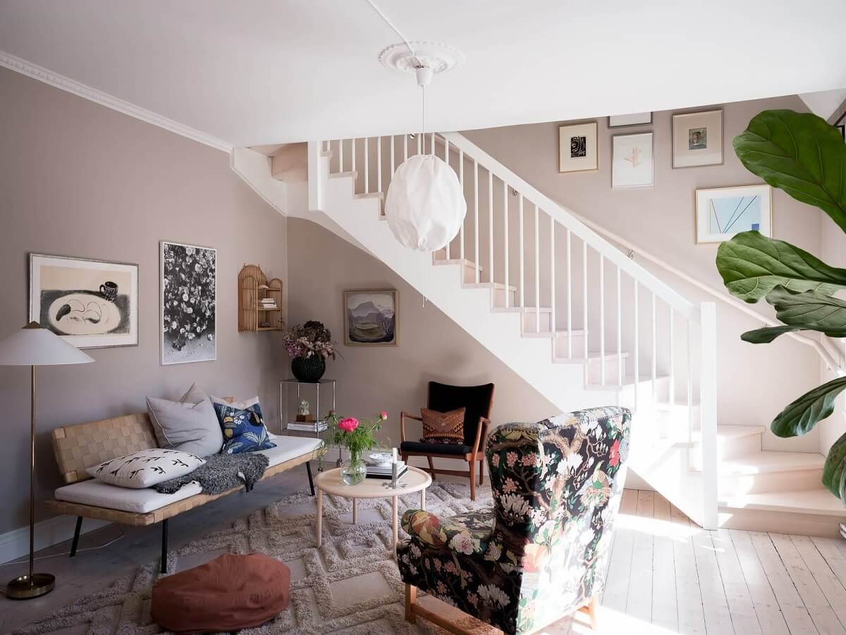 A Scandinavian Duplex That Blends Old and New 1 scandinavian-living-room-floral-armchair-nordroom