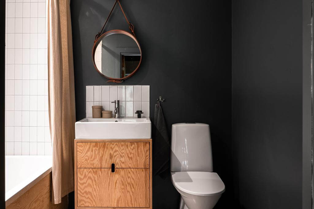 A Renovated Sustainable Home in Sweden 11 small-bathroom-black-walls-nordroom
