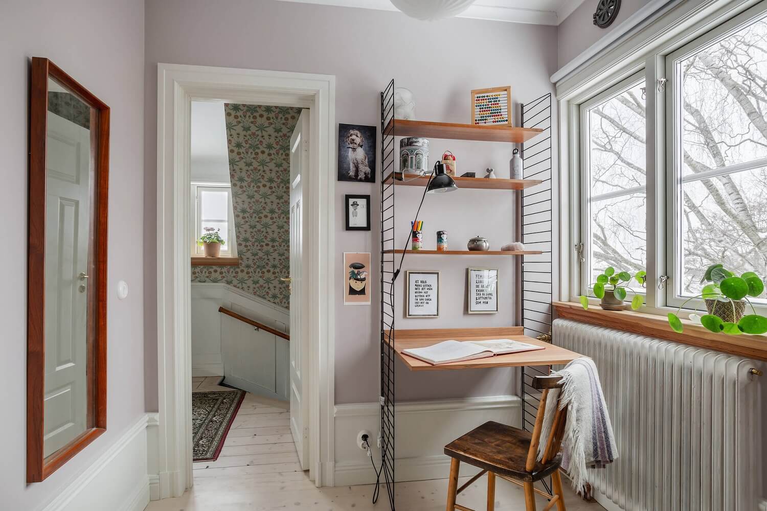 Green Tones and Wallpaper in a Charming Swedish Home 19 small-bedroom-light-gray-walls-built-in-desk-nordroom