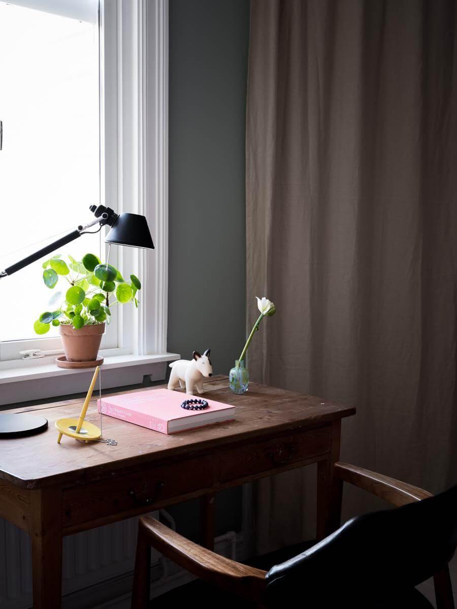 A Scandinavian Duplex That Blends Old and New 13 small-desk-in-front-of-window-nordroom