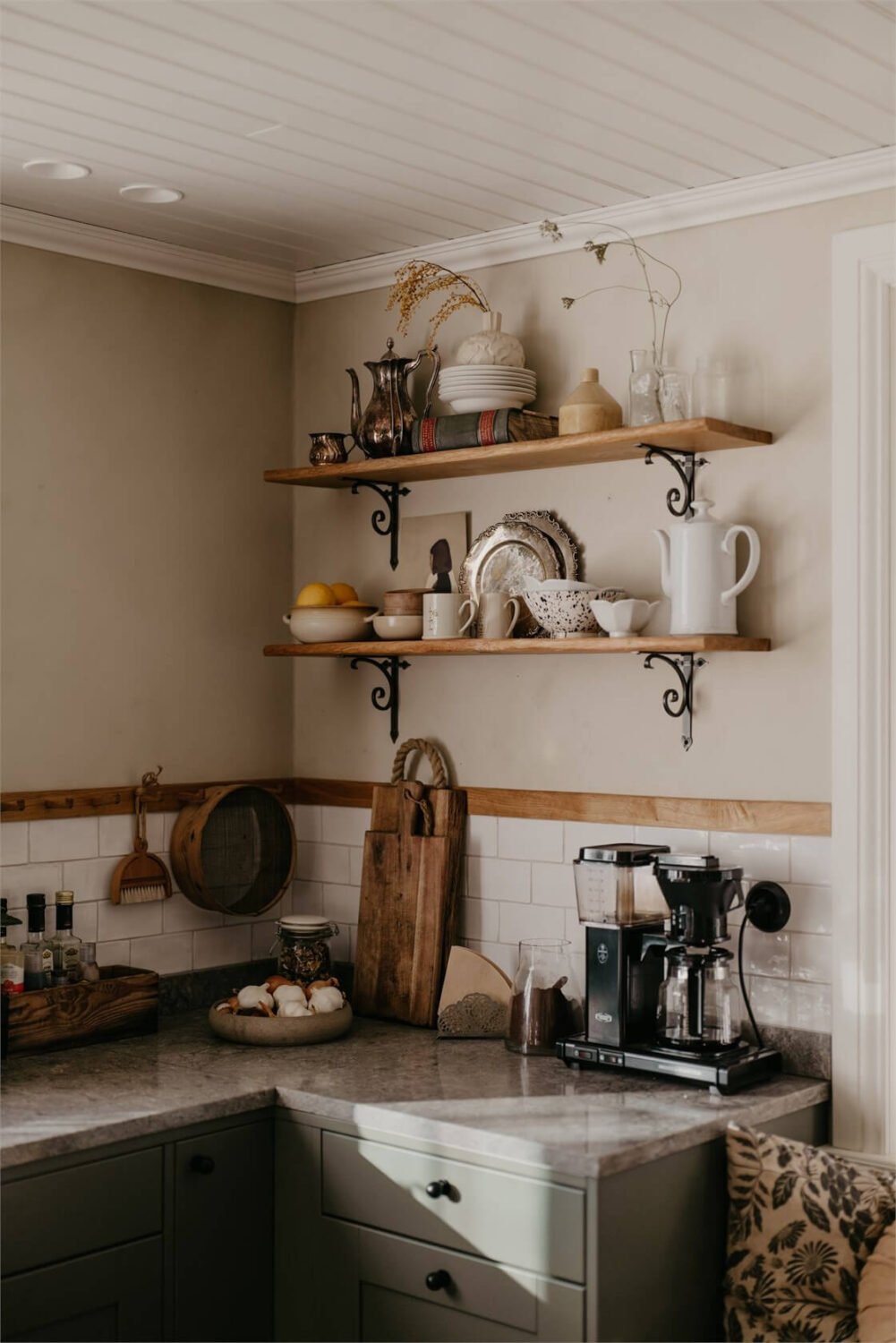 An Idyllic Family Home in the Swedish Countryside 4 vedum-kitchen-green-cabinets-open-shelves-nordroom