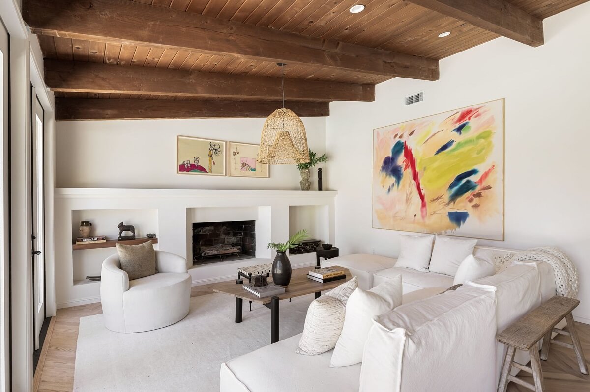 white-furnishings-living-room-wooden-slanted-ceiling-nordroom