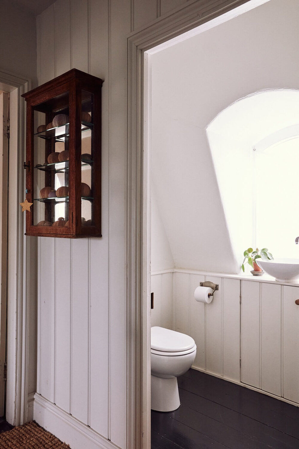 A Spectacular Kitchen in a Historic English House 21 attic-bathroom-black-painted-floorboards-nordroom