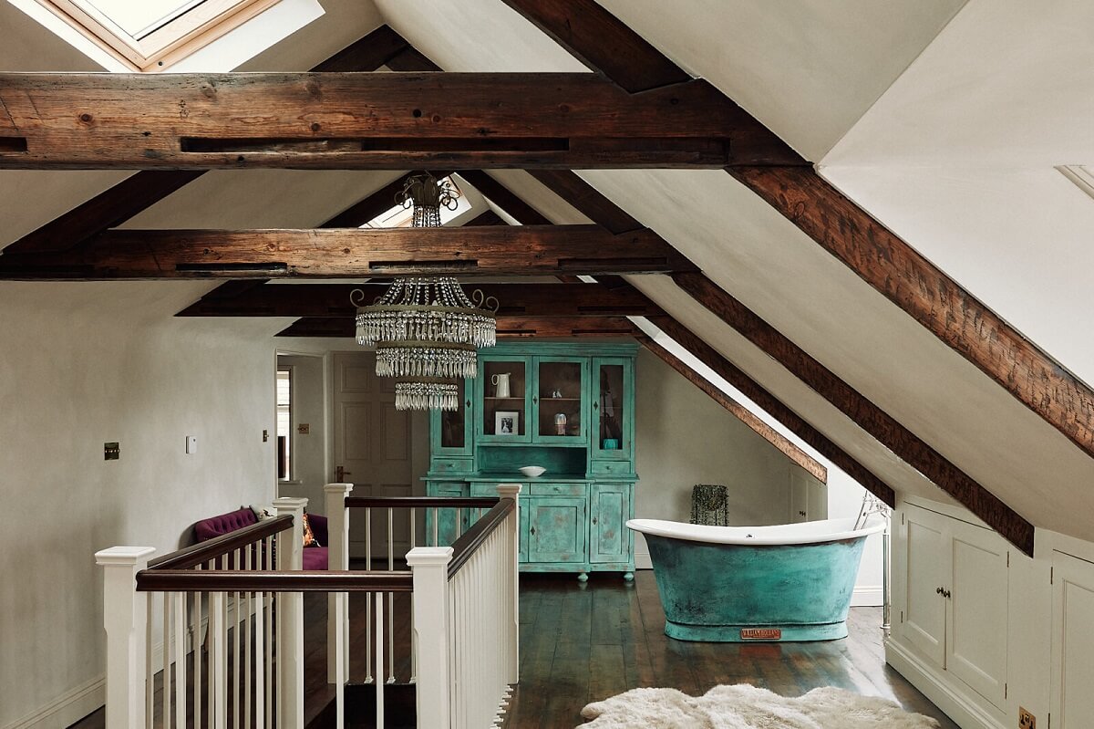 A Georgian Townhouse with Views of the Falmouth Harbour 20 attic-suite-exposed-wooden-beams-freestanding-bath-blue-vintage-cabinet-nordroom