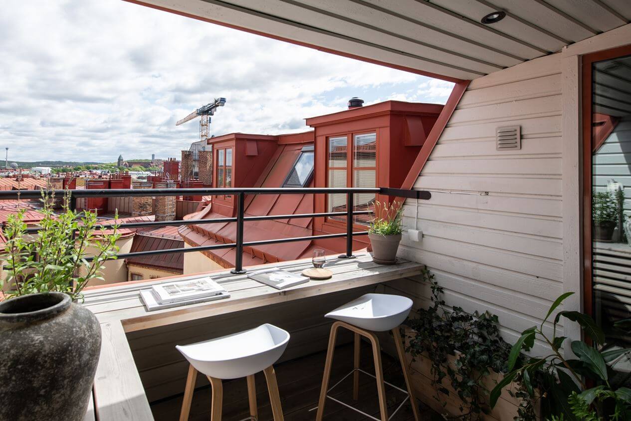 A Stylish Scandinavian Attic Apartment 10 balcony-bar-seating-scandinavian-attic-apartment-nordroom