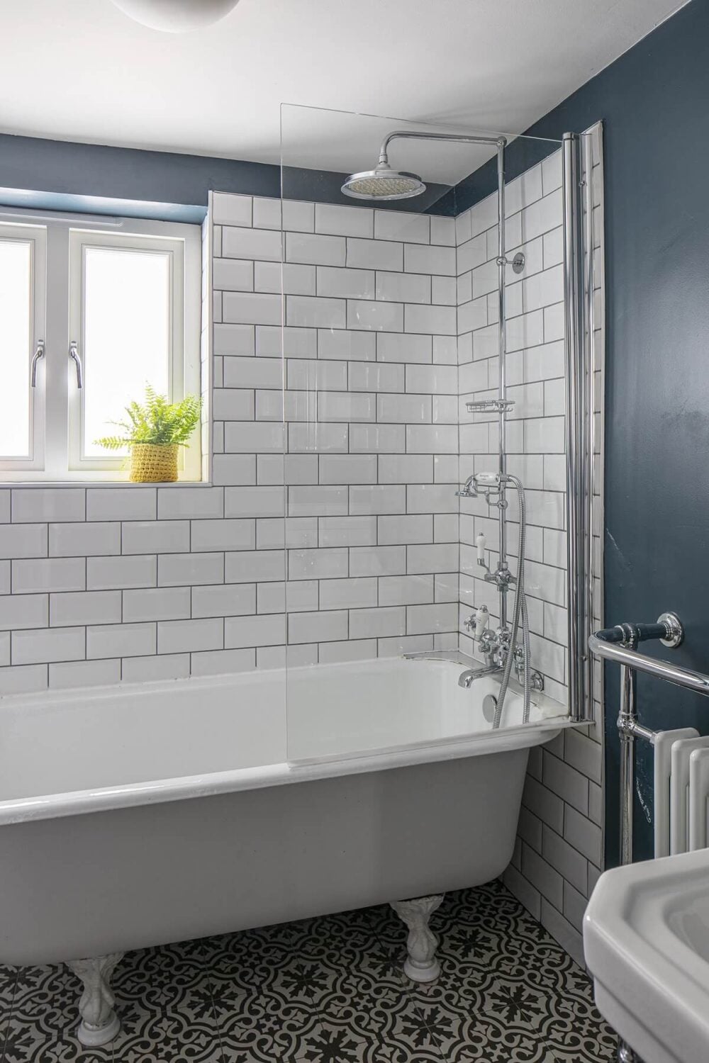 Muted Natural Colors in a Victorian House 12 bathroom-blue-walls-white-subway-tiles-bath-nordroom