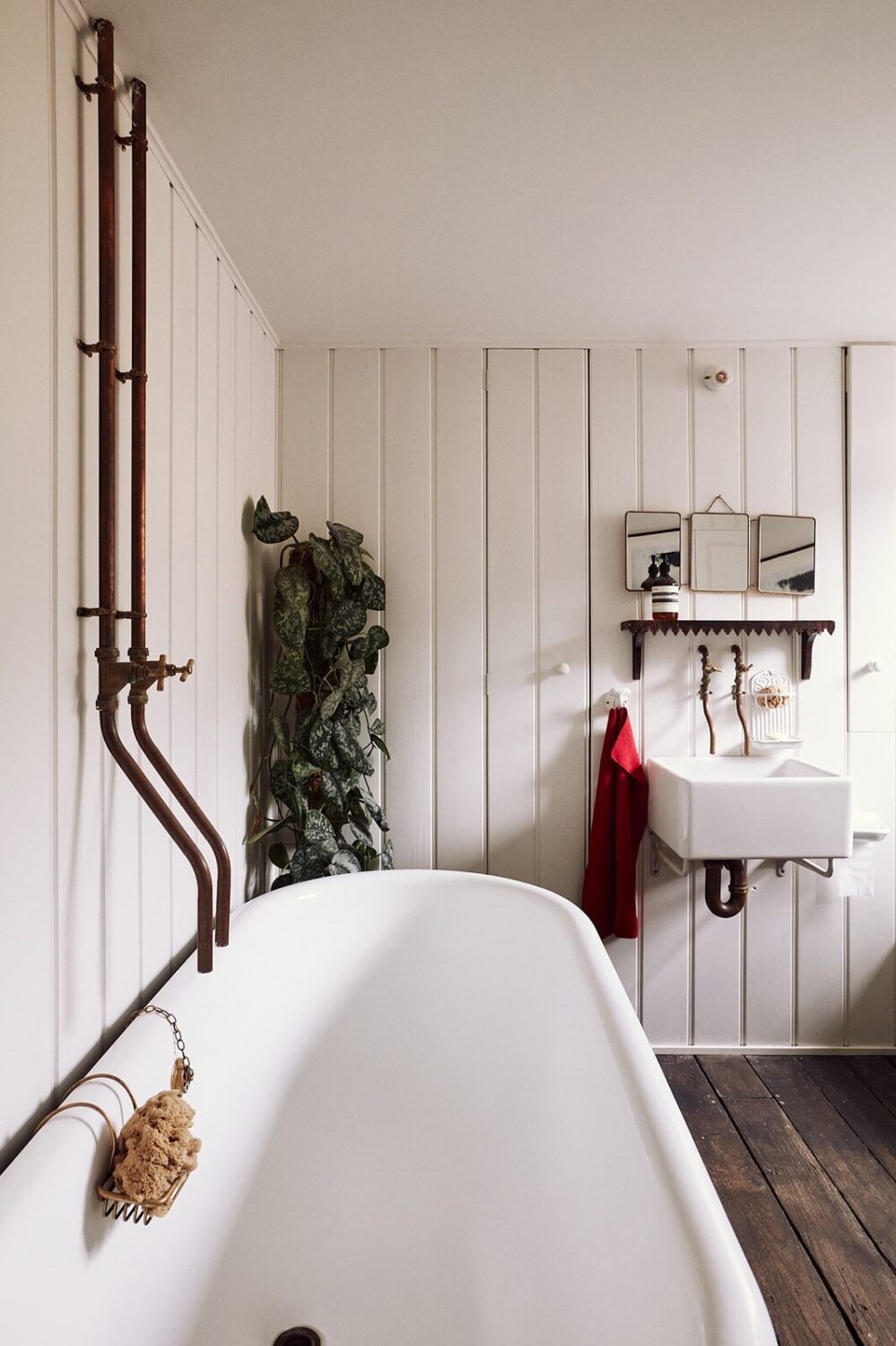 A Spectacular Kitchen in a Historic English House 19 bathroom-rustic-wooden-floorboards-clawfoot-bath-nordroom