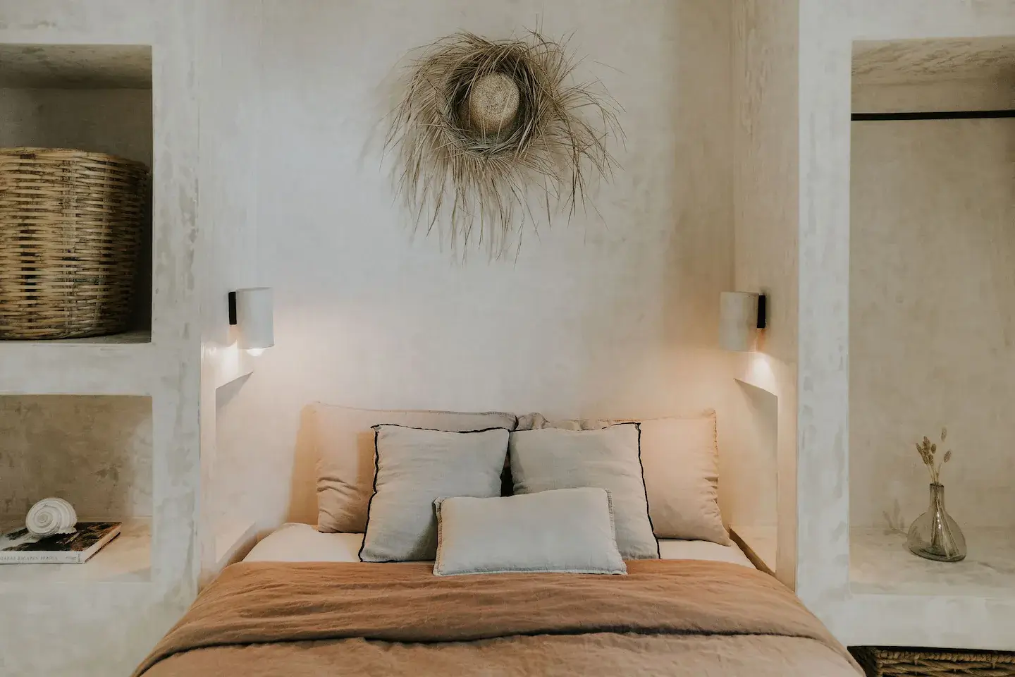 Rustic Wooden Elements in a Stylish Tulum Airbnb 25 bed-niche-clothing-rack-sconces-nordroom