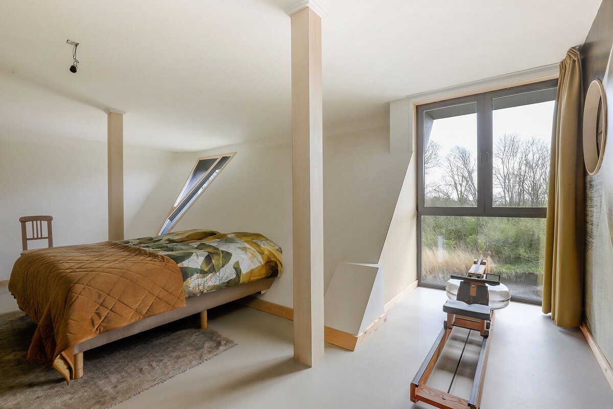 A Unique Upside Down House in The Netherlands 17 bedroom-slanted-ceiling-nordroom