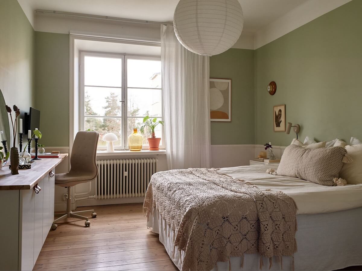 A Scandinavian Apartment with a Light Green Bedroom 15 bedroom-with-home-office-light-green-walls-nordroom