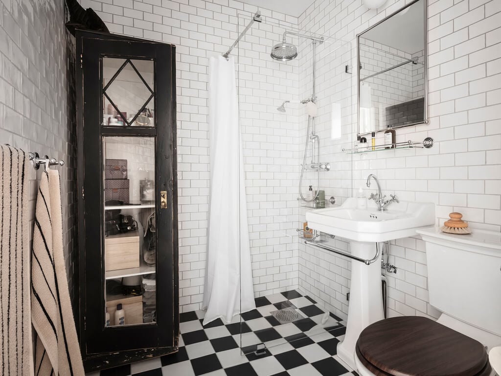 A Scandi Home with Stainless Steel Kitchen and Wallpaper 35 black-white-bathroom-vintage-cabinet-nordroom