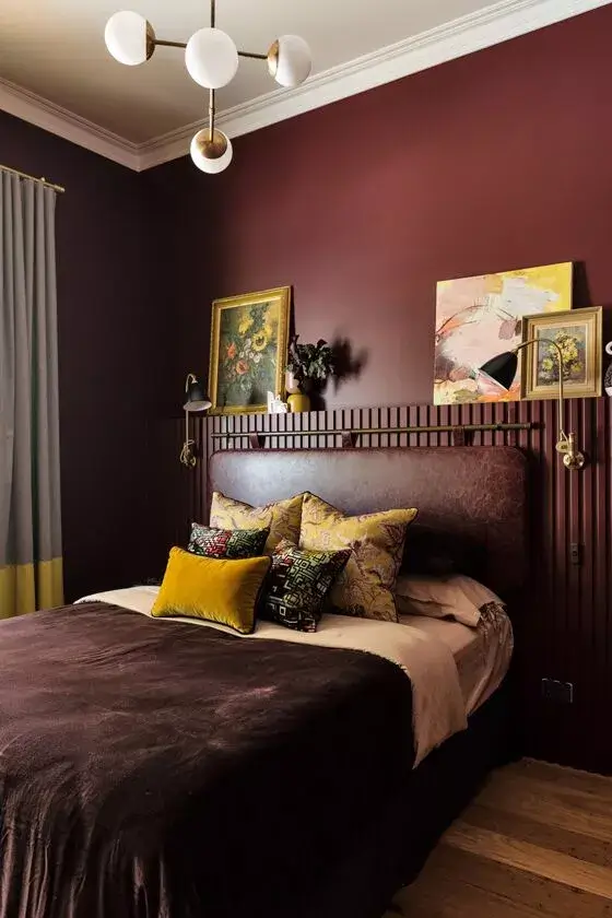 The Best Warm Paint Colors for a Bedroom 5 burgundy-bedroom-leather-headboard-ribbed-feature-wall-nordroom
