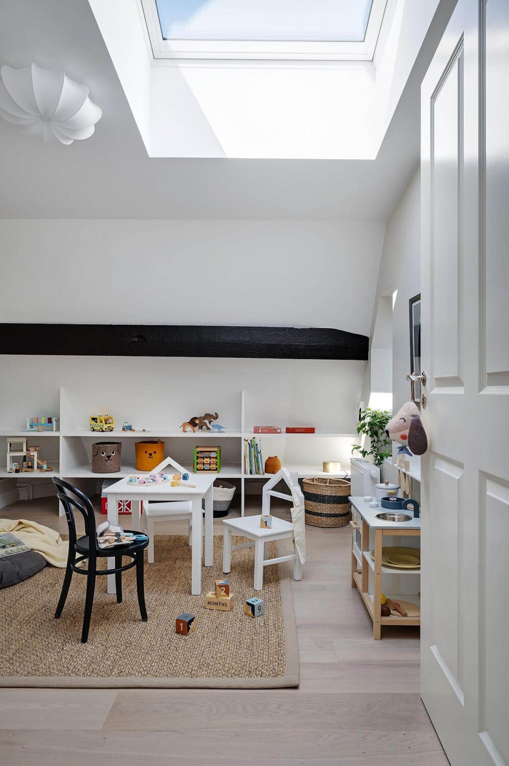 A Modern Scandinavian Attic Apartment 27 childrens-room-skylight-attic-apartment-nordroom