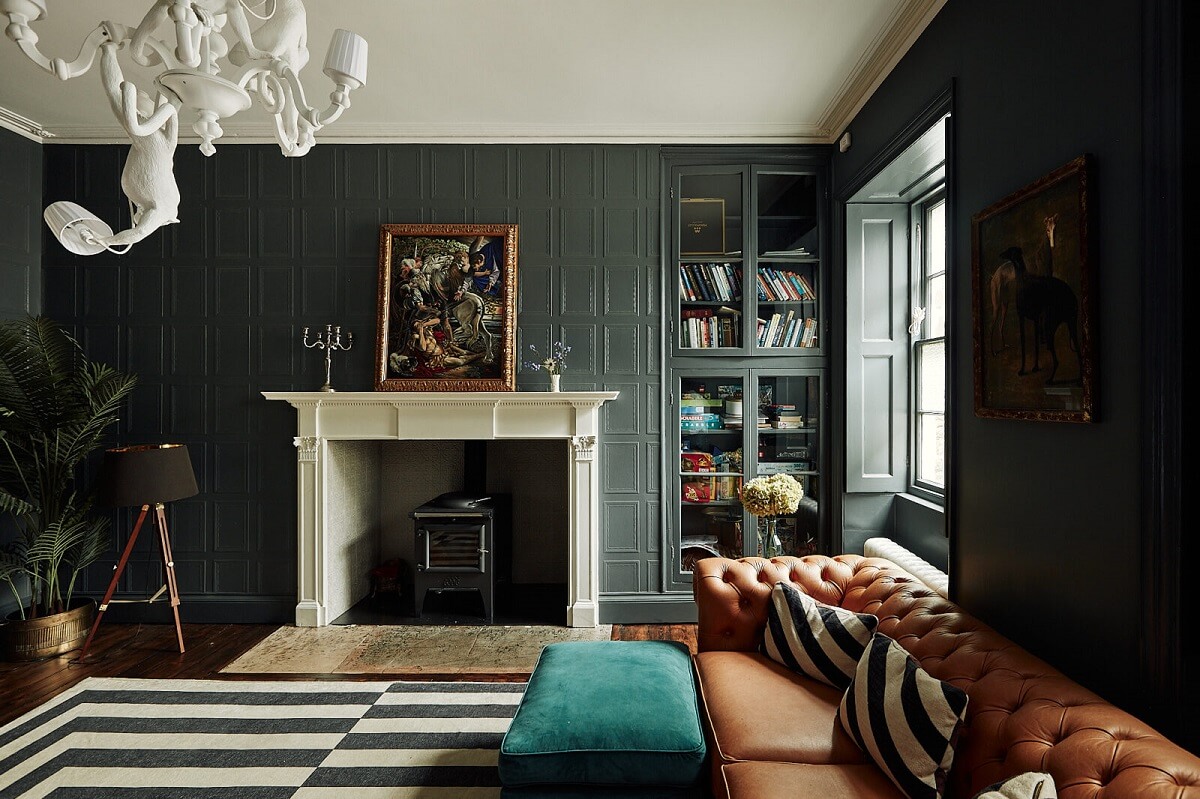 A Georgian Townhouse with Views of the Falmouth Harbour 8 cozy-living-room-dark-gray-walls-fireplace-leather-sofa-nordroom
