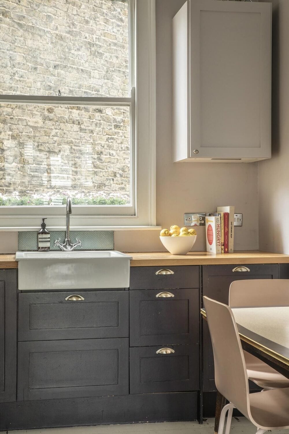 Muted Natural Colors in a Victorian House 6 dark-blue-cabinets-nordroom
