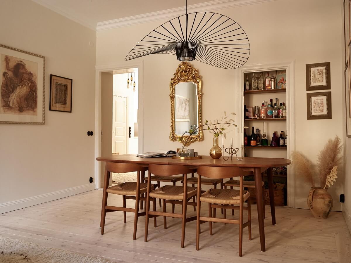 Warm Muted Colors in a Stockholm Apartment 4 dining-table-built-in-shelves-beige-living-room-nordroom
