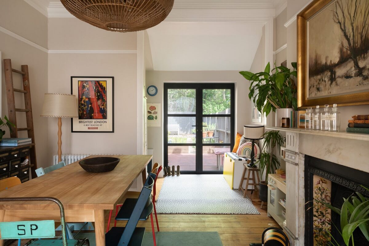 Colorful Rooms in a Family Home in London 5 dining-table-industrial-chairs-fireplace-nordroom