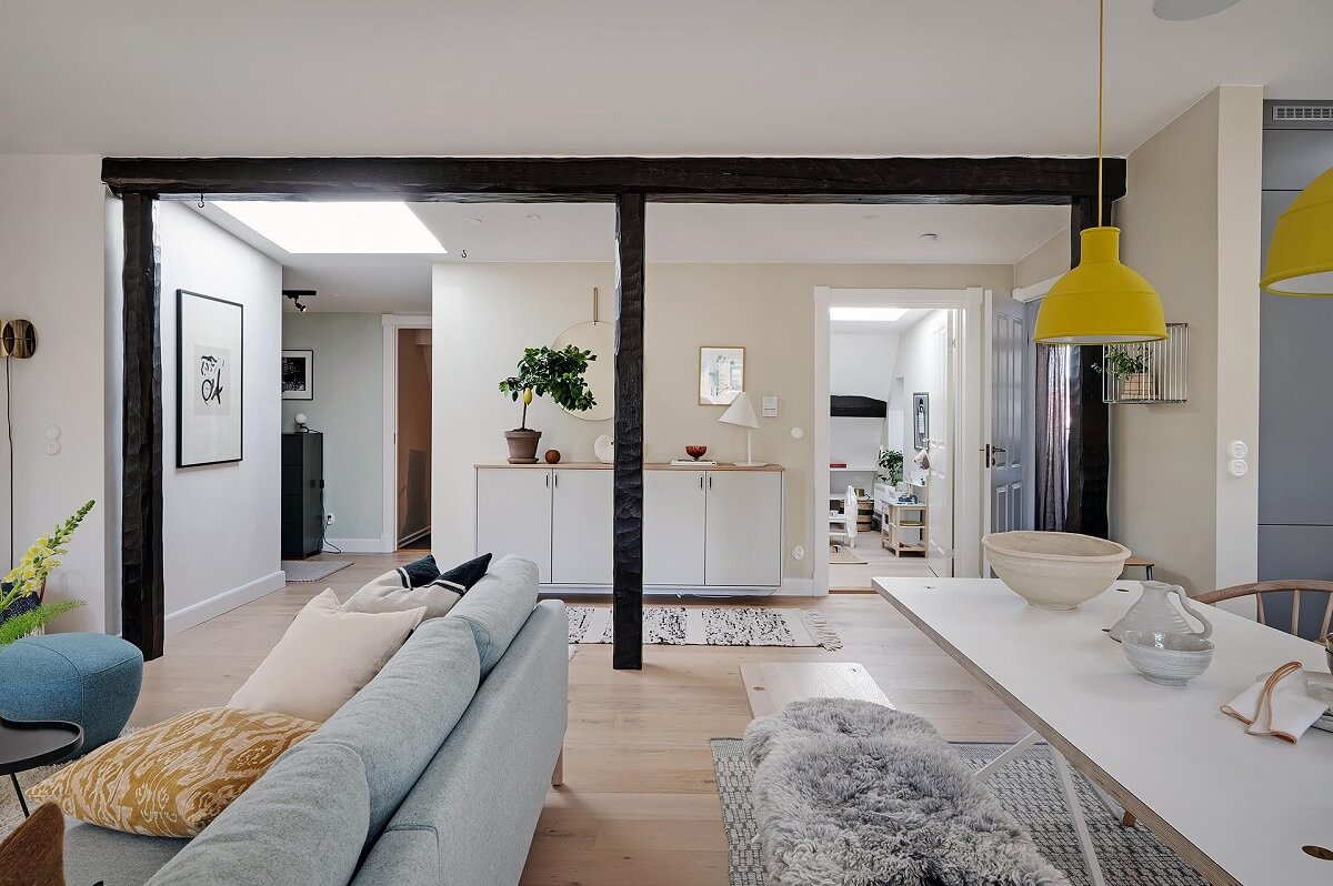 A Modern Scandinavian Attic Apartment 13 exposed-beams-modern-living-room-nordroom