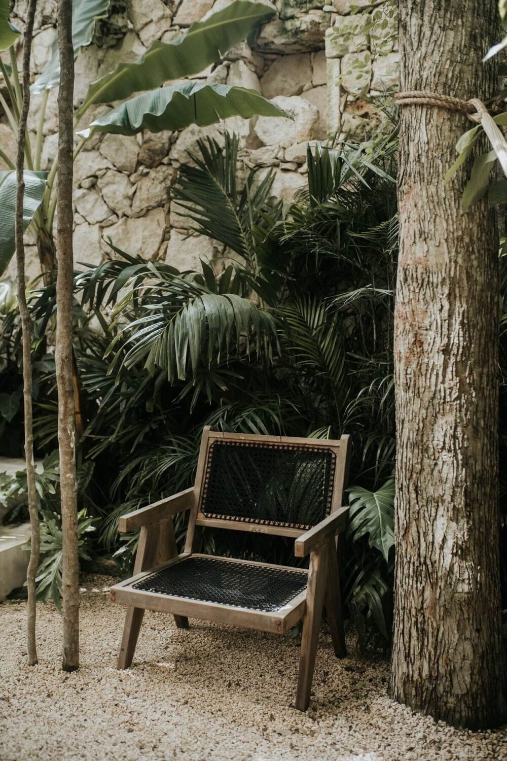 Rustic Wooden Elements in a Stylish Tulum Airbnb 29 garden-seating-airbnb-apartment-tulum-nordroom