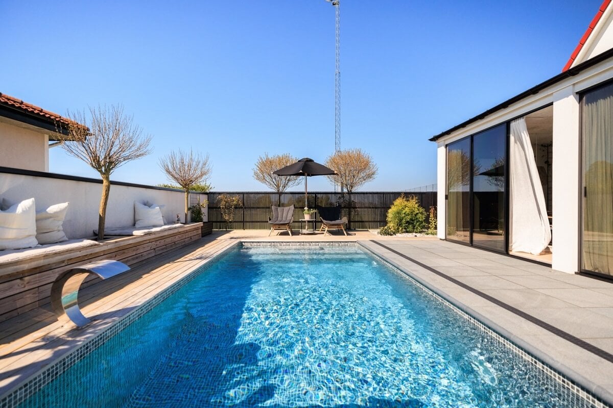 A Monochrome Swedish Villa with High Ceilings 29 garden-swimming-pool-monochrome-swedish-villa-nordroom
