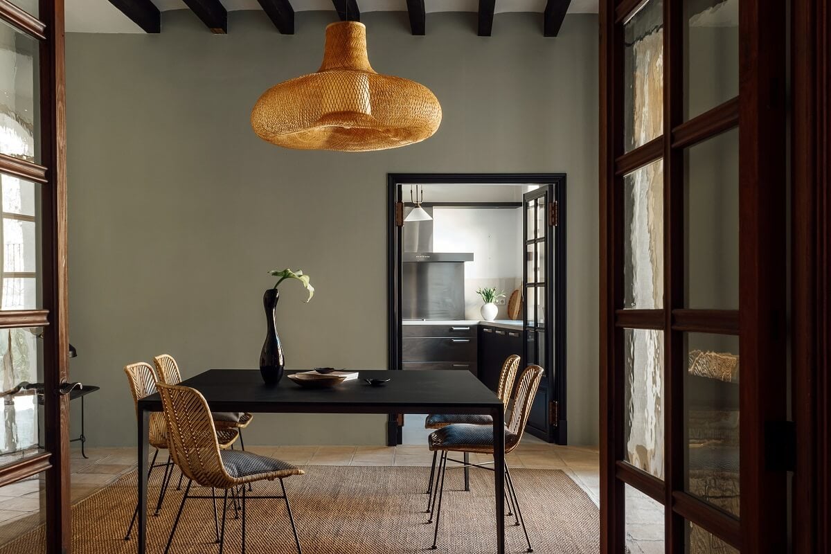 A Renovated Historic Townhouse on Mallorca 10 gray-dining-room-wooden-table-exposed-beams-nordroom