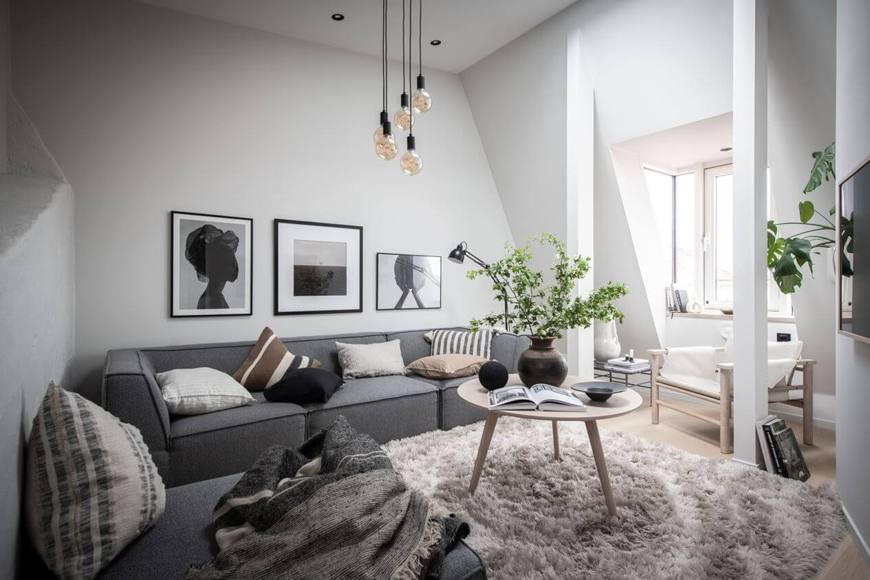 A Stylish Scandinavian Attic Apartment 2 gray-white-living-room-dormer-window-nordroom