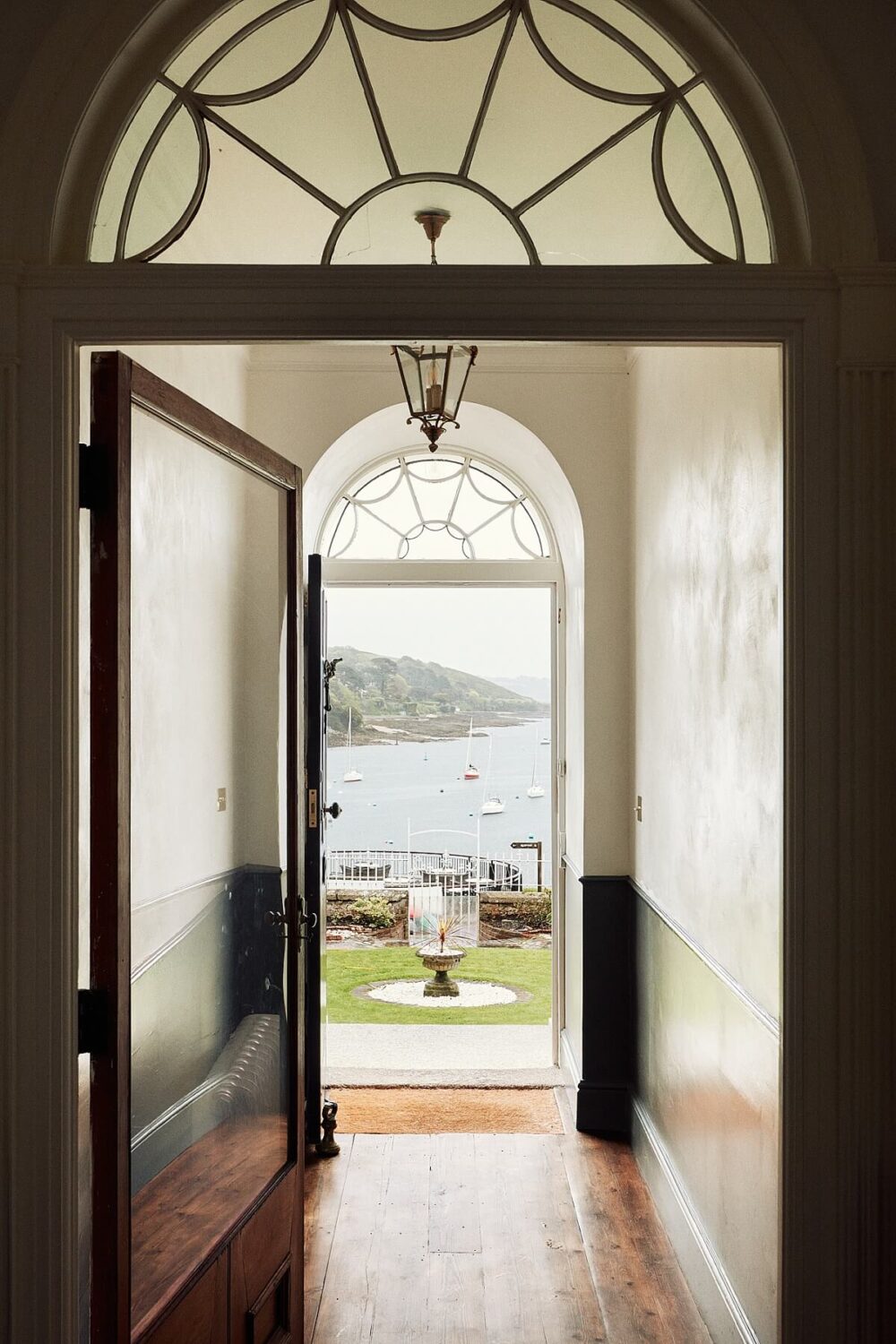 A Georgian Townhouse with Views of the Falmouth Harbour 11 hallway-arched-doorway-ocean-view-nordroom