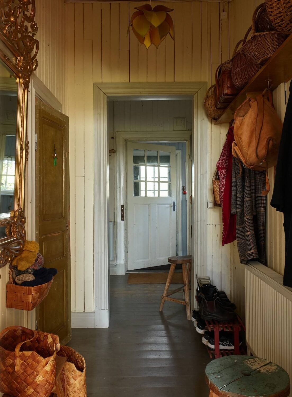 A Vintage Colorful Family Home in the Swedish Countryside 24 hallway-painted-floorboards-vintage-home-sweden-nordroom