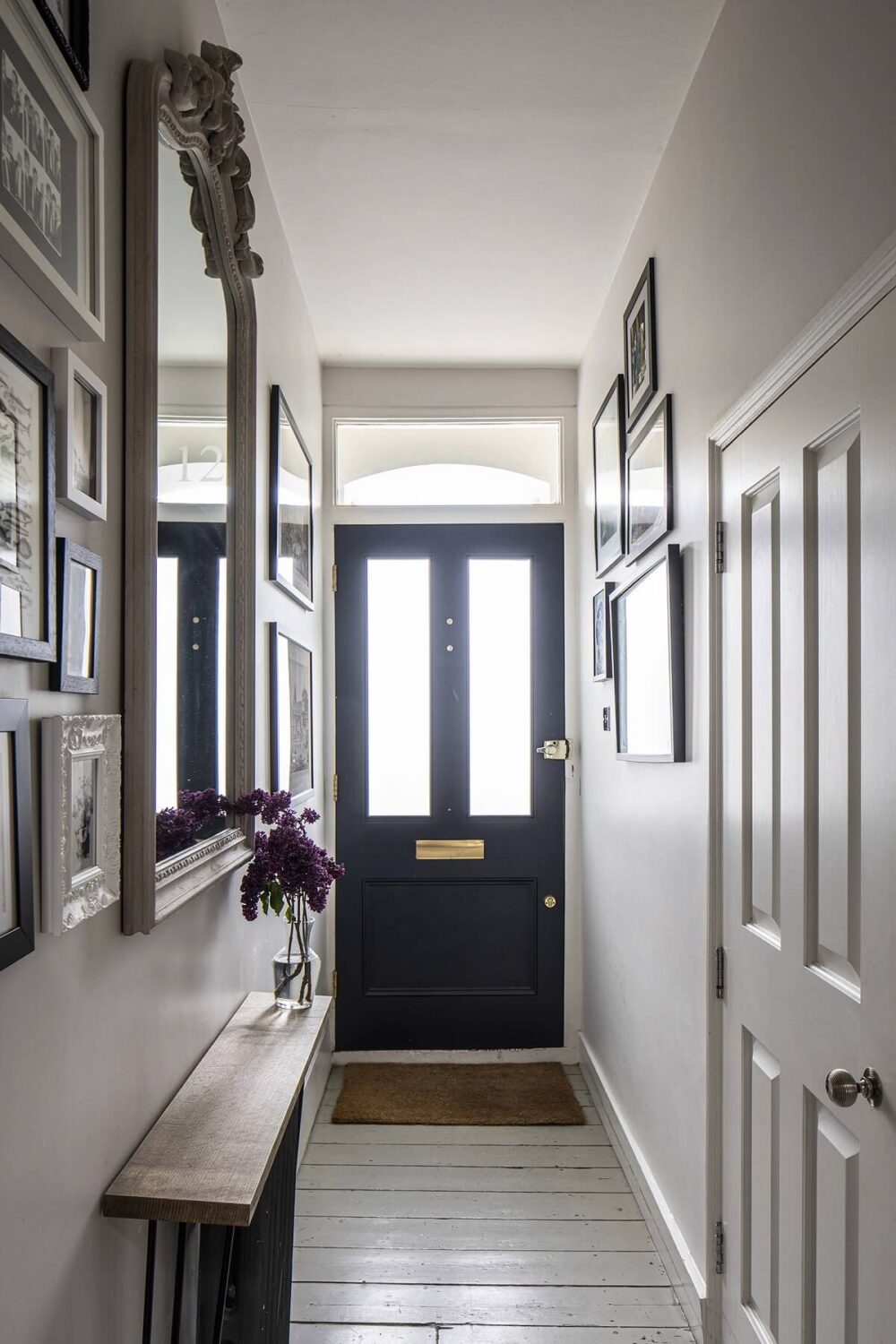 Muted Natural Colors in a Victorian House 19 hallway-wooden-floor-gallery-wall-antique-mirror-nordroom