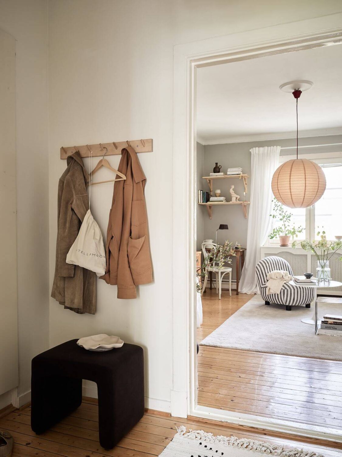 A Small Studio Apartment with Gray Walls 10 hallway-wooden-floor-scandinavian-studio-apartment-nordroom
