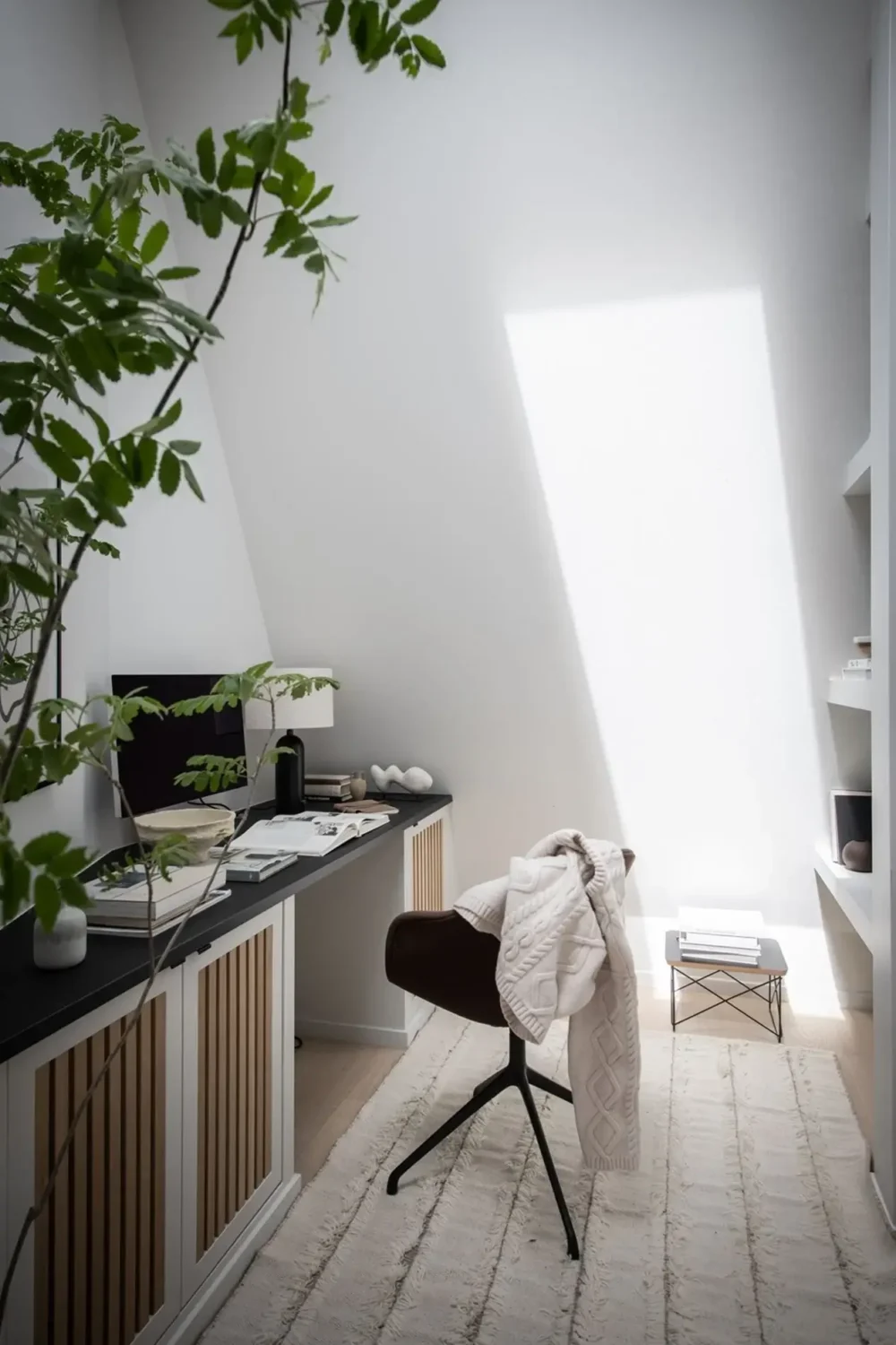 A Stylish Scandinavian Attic Apartment 5 home-office-slanted-ceiling-attic-apartment-nordroom