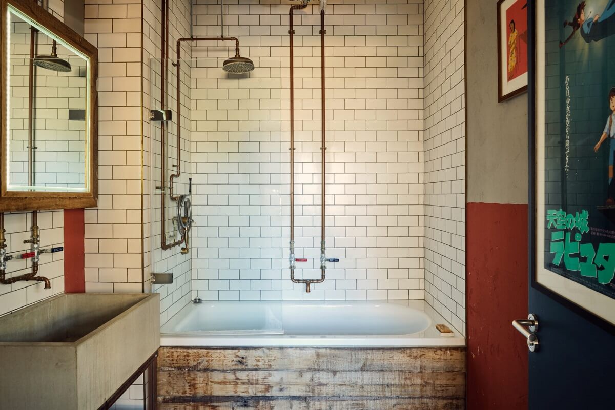 An Industrial Warehouse Apartment in London 12 industrial-bathroom-white-subway-tiles-wood-cladding-bath-nordroom
