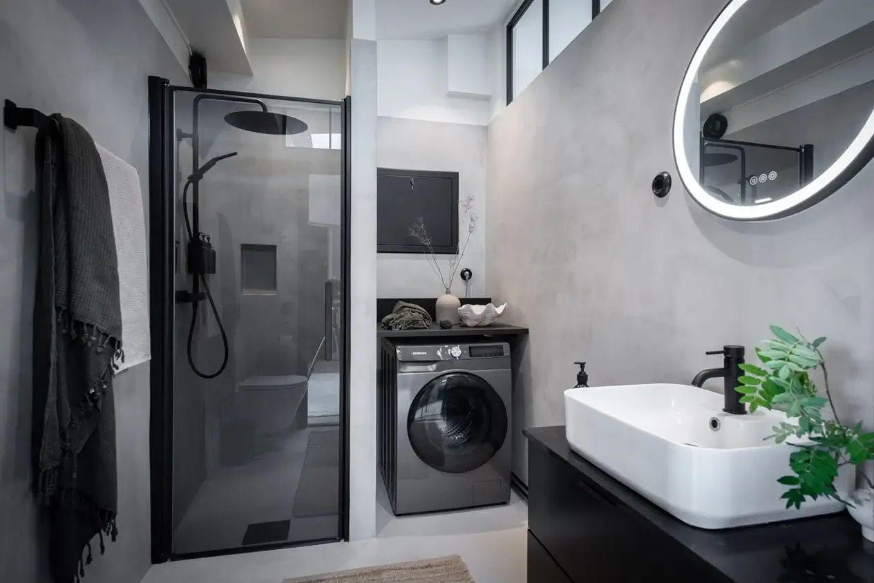 A Stylish Scandinavian Attic Apartment 14 industrial-style-bathroom-washing-machine-nordroom