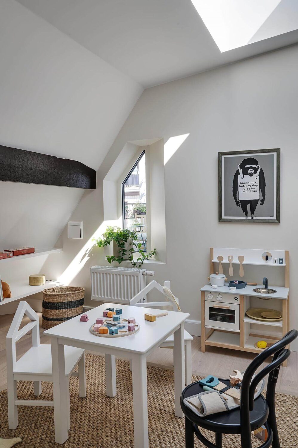 A Modern Scandinavian Attic Apartment 26 kids-bedroom-white-walls-skylight-slanted-ceiling-nordroom