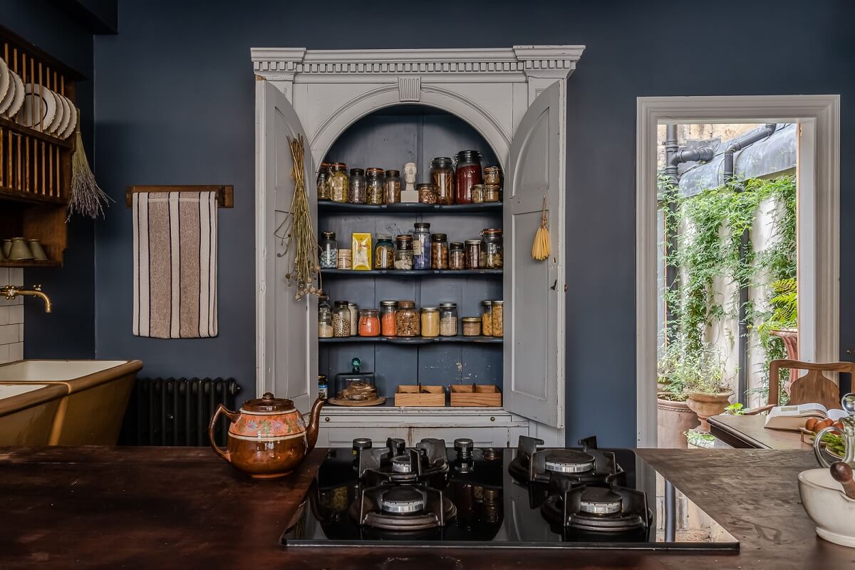 A Unique Historic House with Old Fashioned Shop in Bath 22 kitchen-built-in-cabinet-blue-walls-mews-house-nordroom