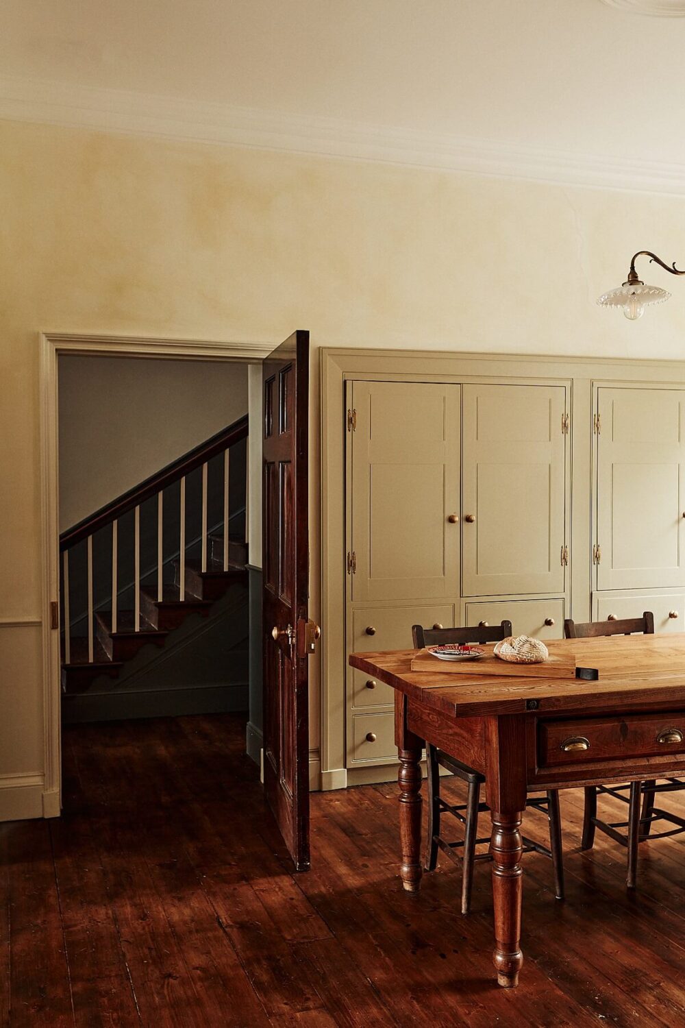 A Georgian Townhouse with Views of the Falmouth Harbour 7 kitchen-farmhouse-style-built-in-kitchen-cabinets-rustic-wooden-table-nordroom