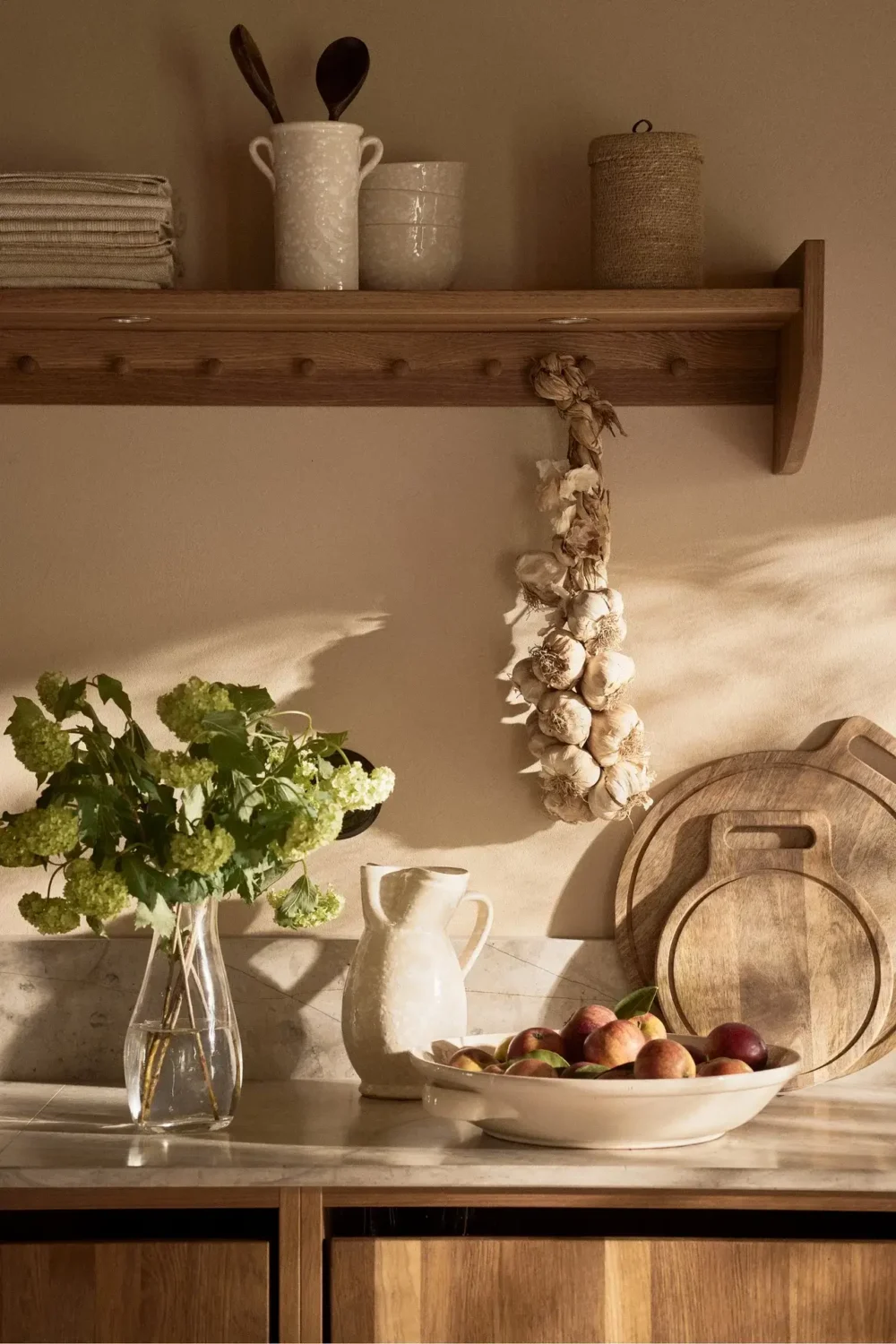 A Serene Summer House in Sweden 5 kitchen-wooden-cabinets-shelf-summer-house-nordroom