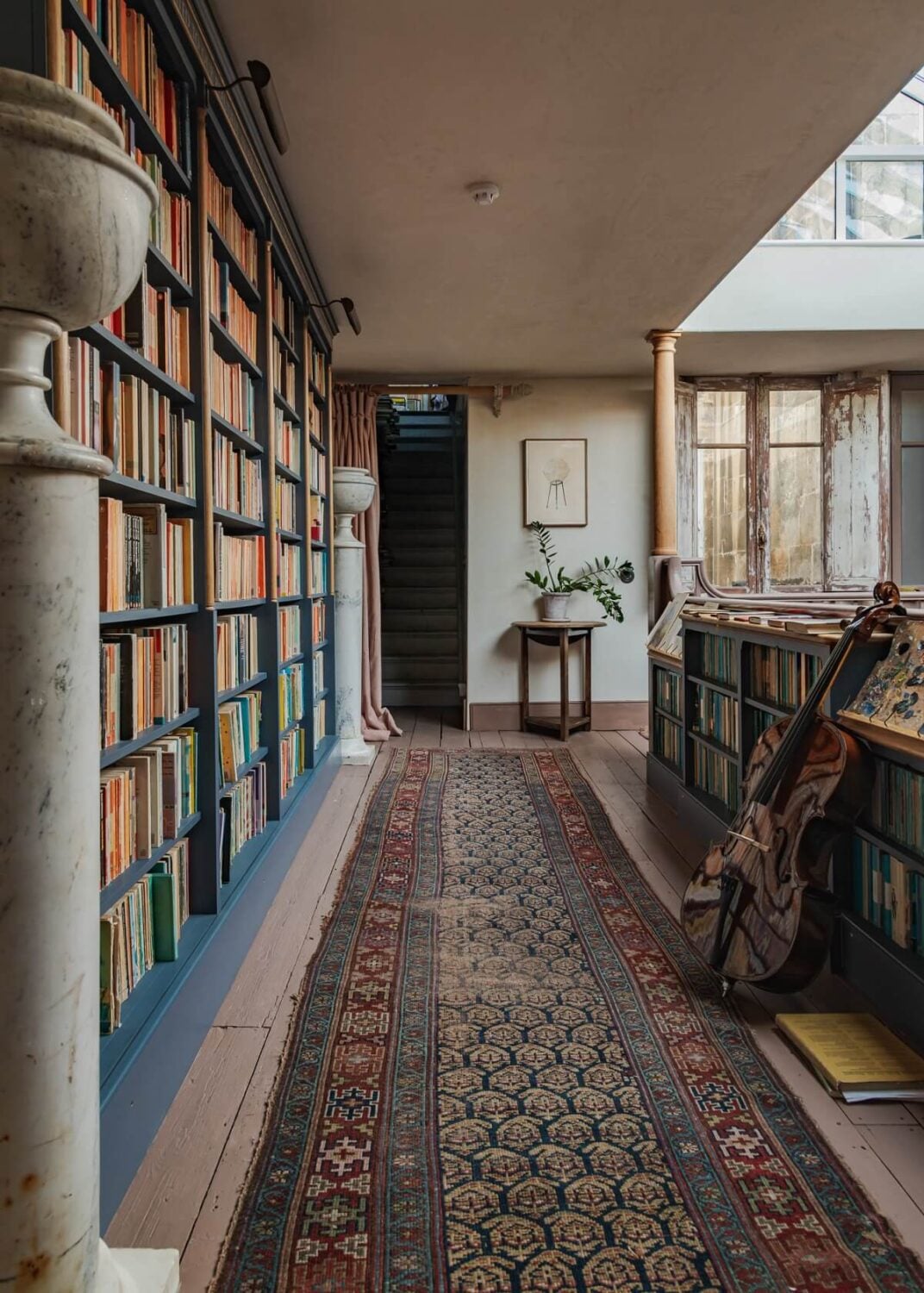 A Unique Historic House with Old Fashioned Shop in Bath 10 landing-reading-room-bookshelves-vintage-rugs-nordroom