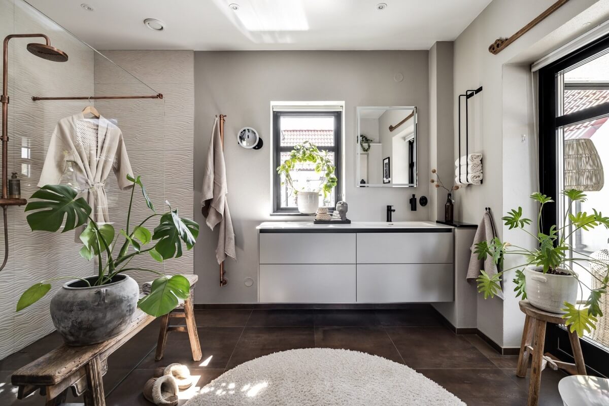 A Monochrome Swedish Villa with High Ceilings 22 large-bathroom-floating-vanity-walk-in-shower-nordroom