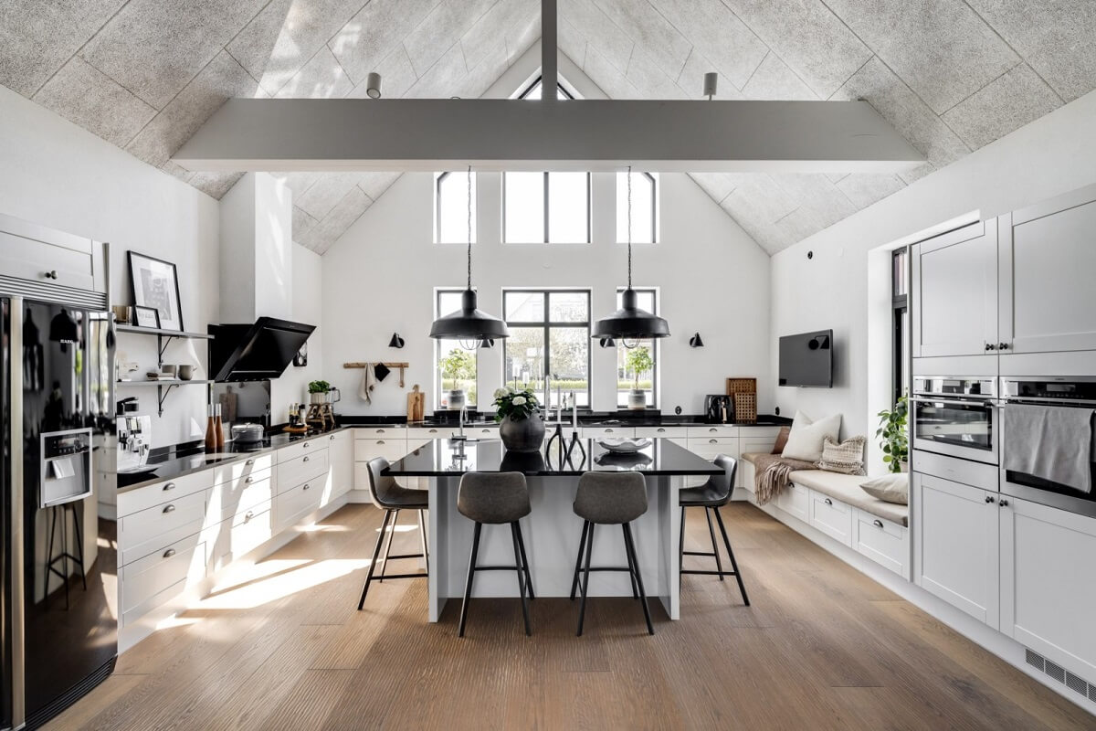 A Monochrome Swedish Villa with High Ceilings 12 large-black-white-kitchen-ceiling-beams-high-ceiling-nordroom
