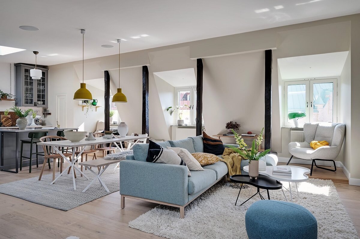 A Modern Scandinavian Attic Apartment 1 light-blue-sofa-modern-design-attic-apartment-nordroom