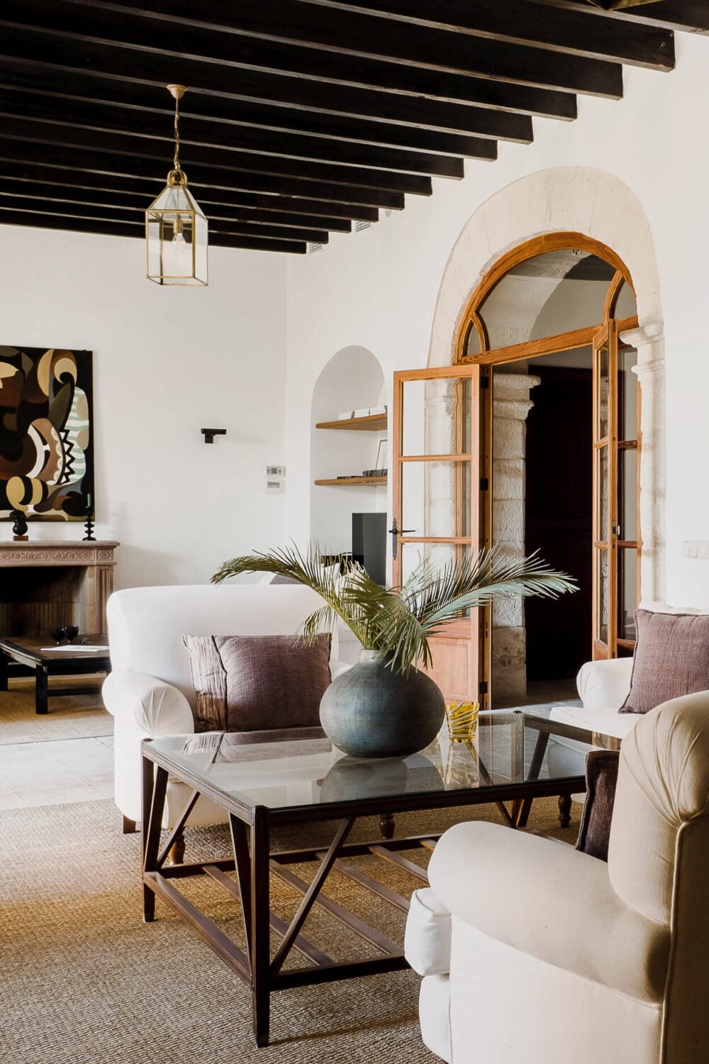 A Renovated Historic Townhouse on Mallorca 4 living-room-exposed-wooden-ceiling-beams-nordroom