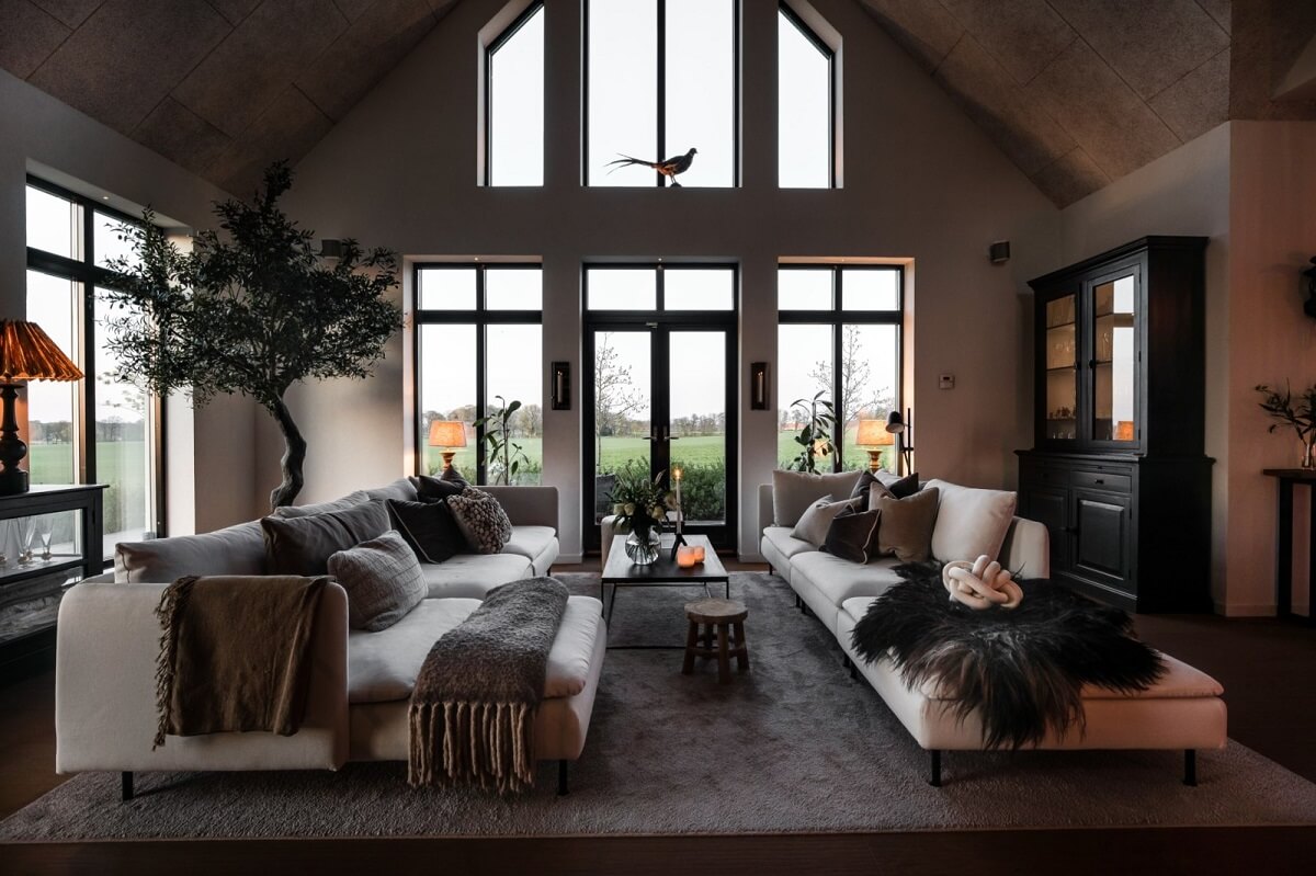 A Monochrome Swedish Villa with High Ceilings 4 living-room-high-ceiling-at-night-nordroom