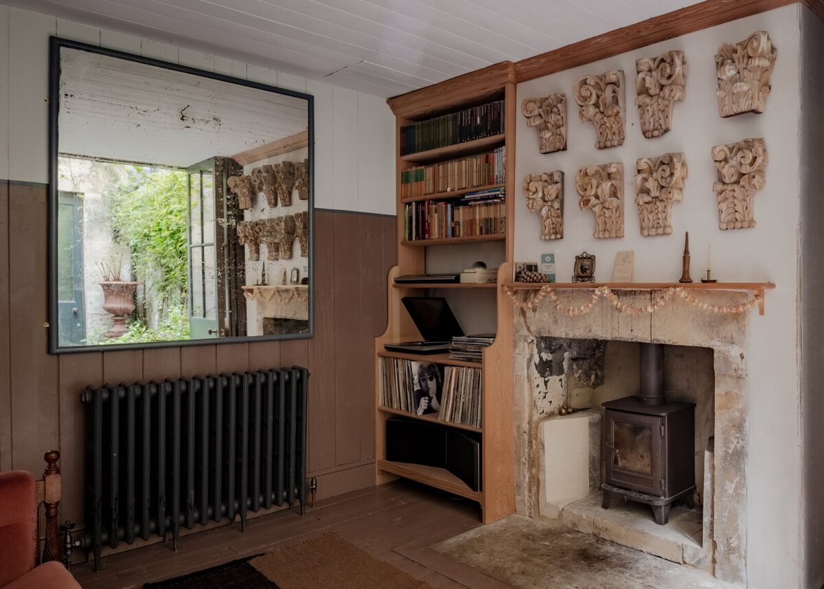 A Unique Historic House with Old Fashioned Shop in Bath 12 living-room-large-mirror-fireplace-brown-painted-foorboards-nordroom