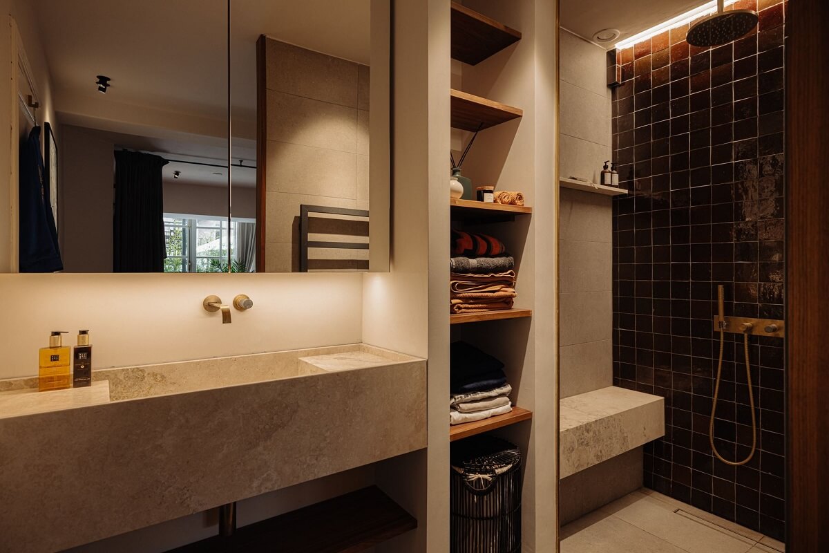 A Luxurious Duplex Apartment in Amsterdam 16 master-bathroom-walk-in-shower-black-tiles-nordroom