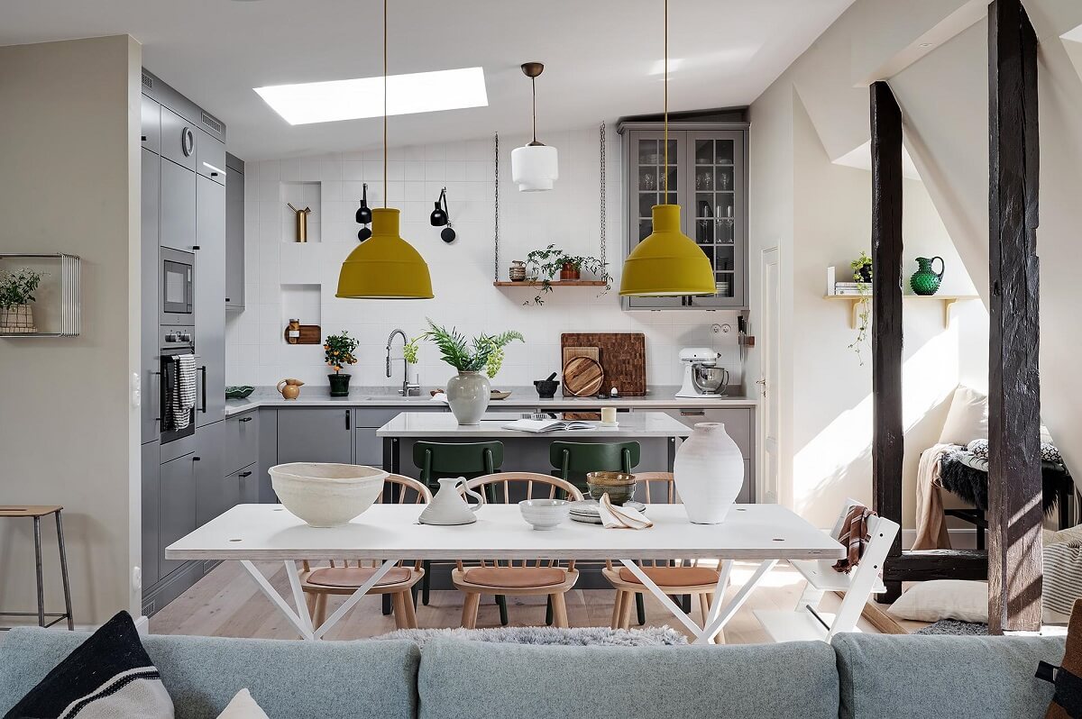 A Modern Scandinavian Attic Apartment 3 modern-open-plan-living-room-kitchen-wooden-beams-skylight-nordroom